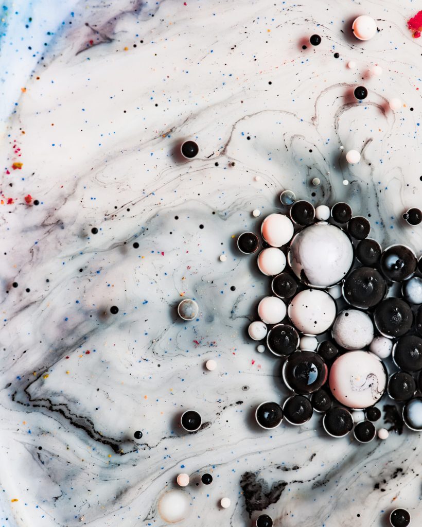 Colored abstract background.Ink Bubbles In Water. Abstract colorful paint. Macro photo